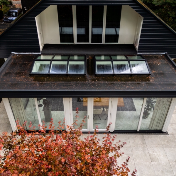 Zadeldaken in Apeldoorn in plat dak